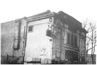 Black and white photo of front and side of building