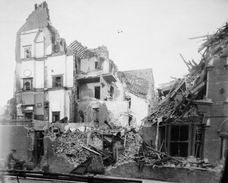 Several collapsed terraced houses, including 4 storey buildings