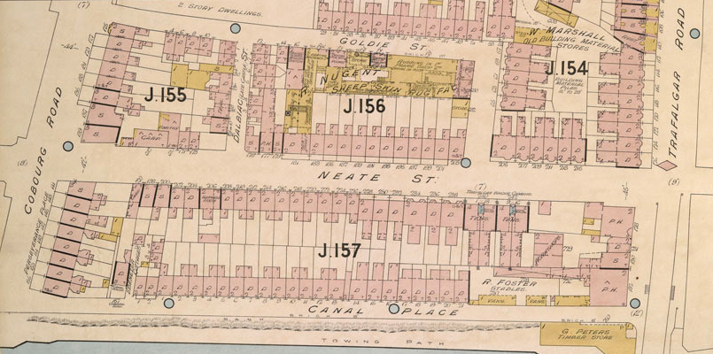 Coloured plan showing the location of terraced houses on Neate St, with the Nugent Factory behind on Goldie St. The block is numbered J.156.