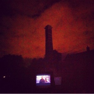 Photo of Old Library chimney with movie screen below 