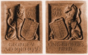 Lion and Unicorn emblems with dates 1910-1936
